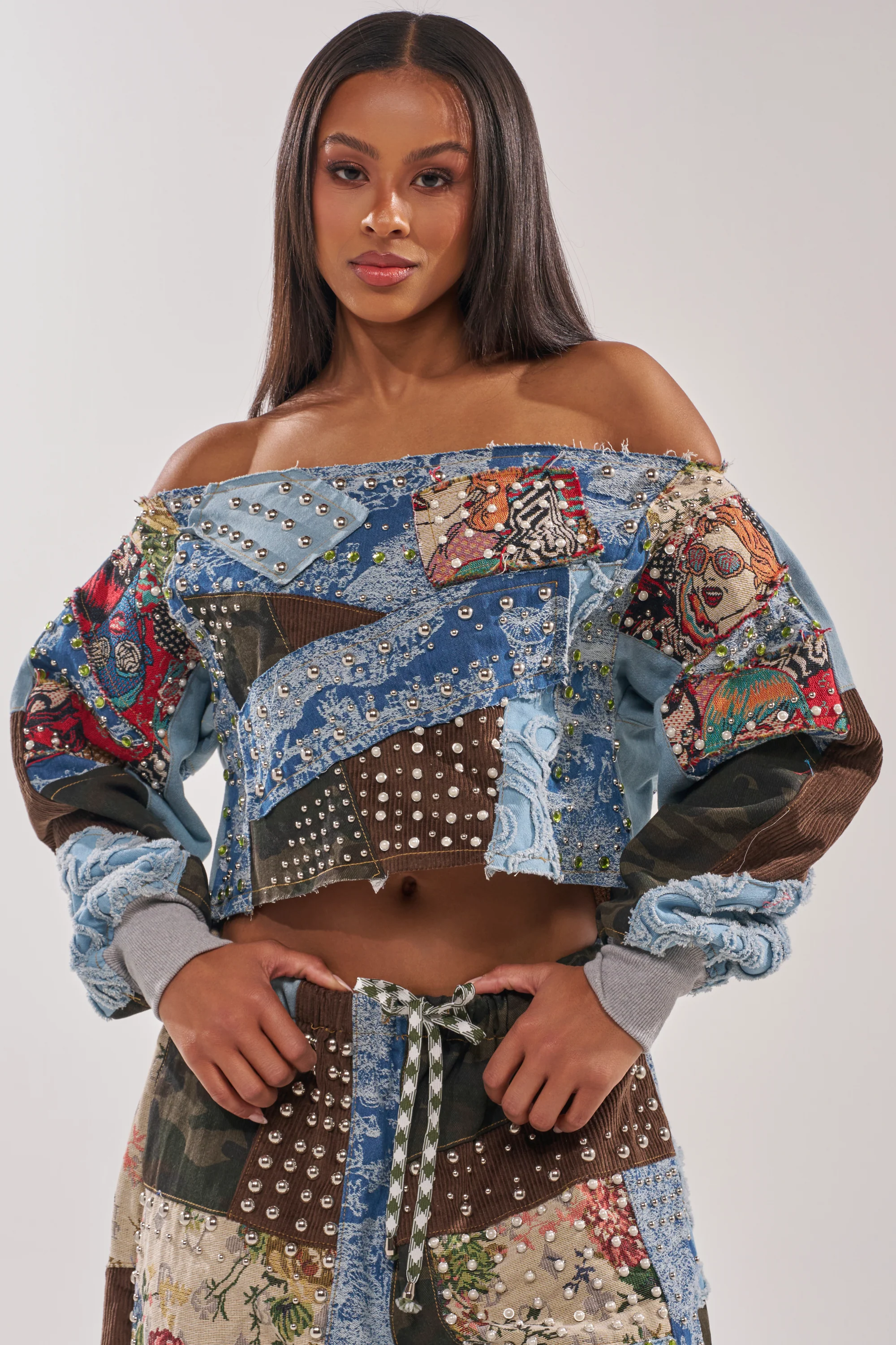 CALL ME CRAZY PATCHWORK OFF THE SHOULDER SWEATSHIRT