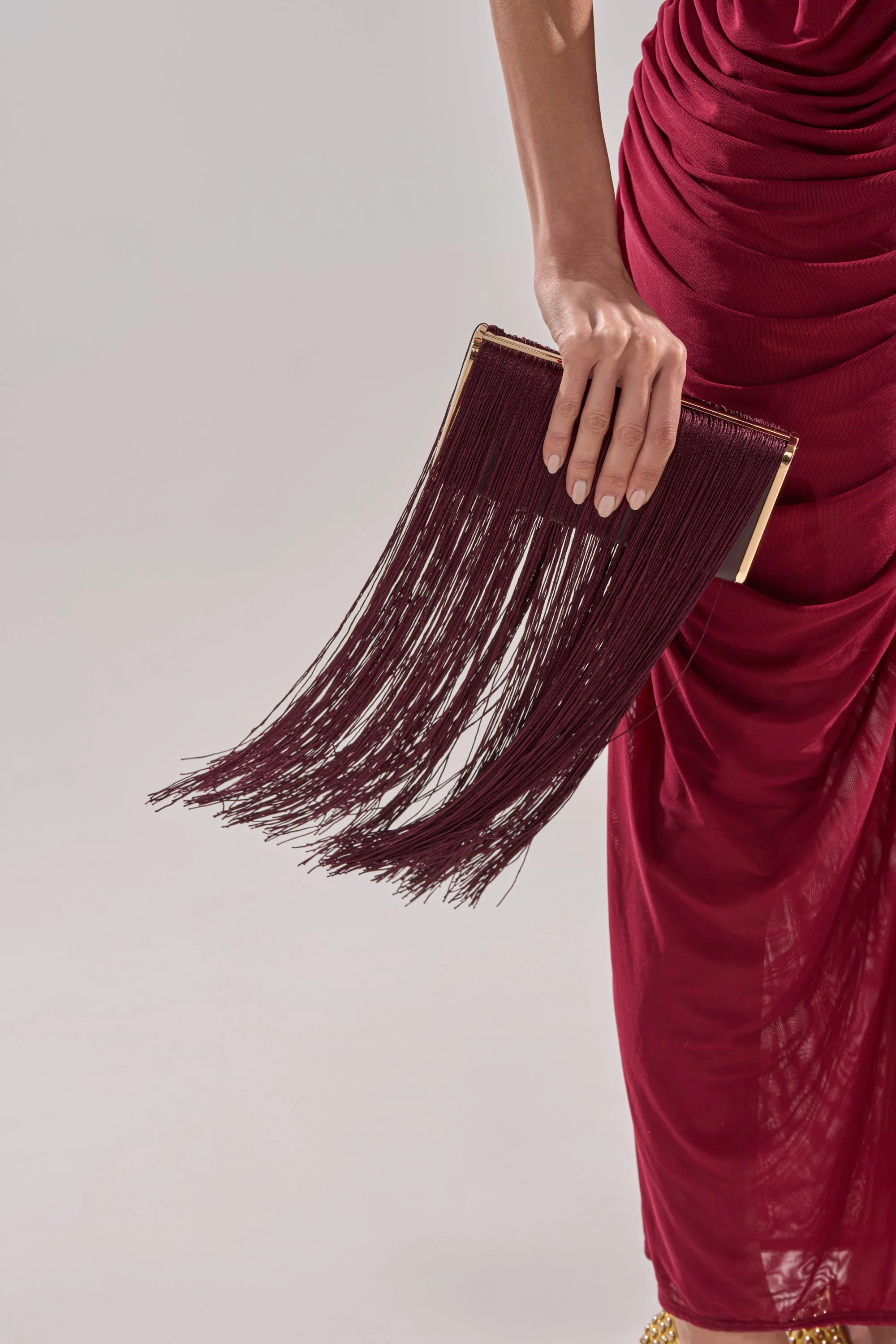 IN THE FRINGE CLUTCH