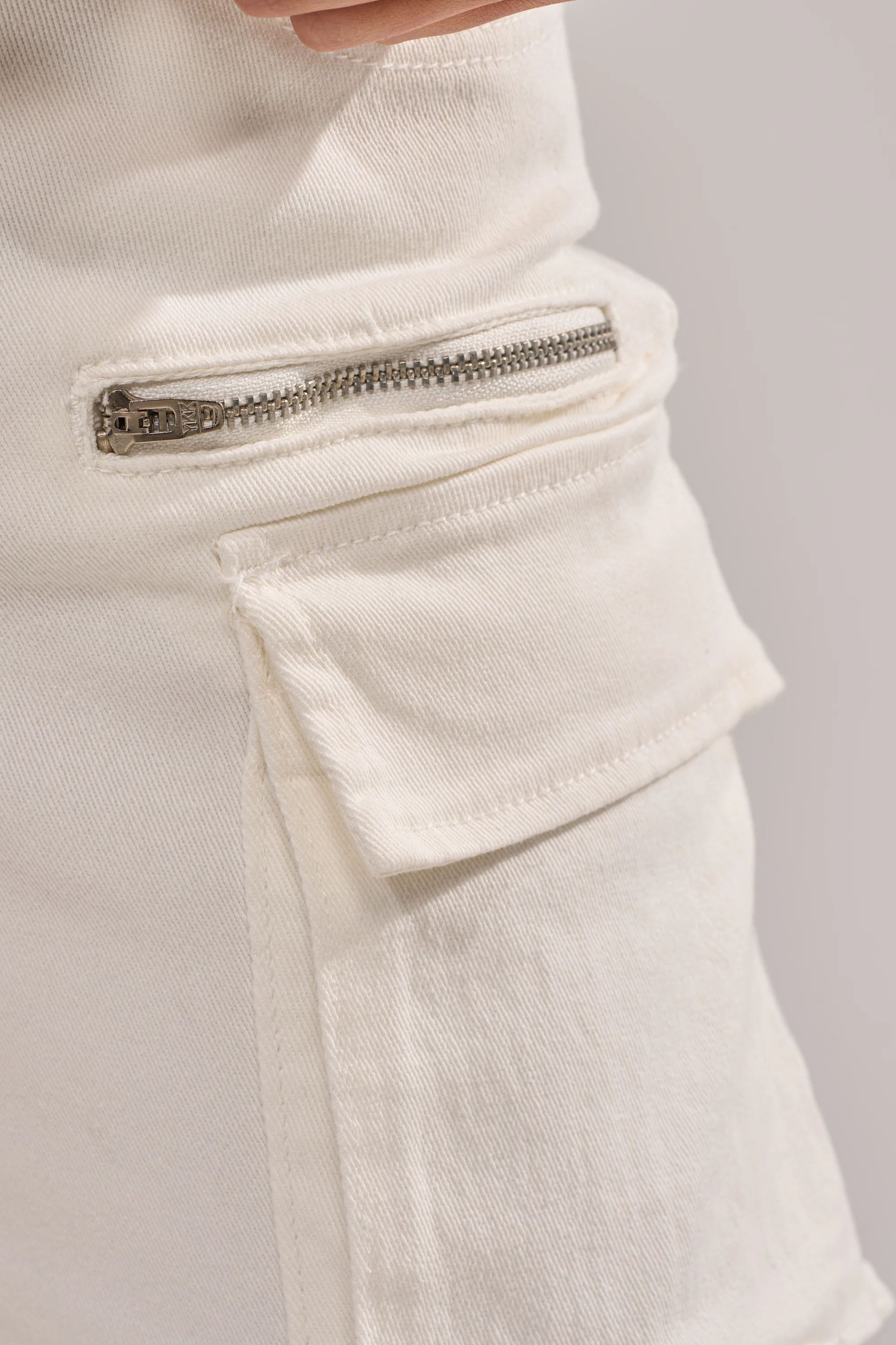 IT GETS EASIER STACKED CARGO PANT IN WHITE - Image 10