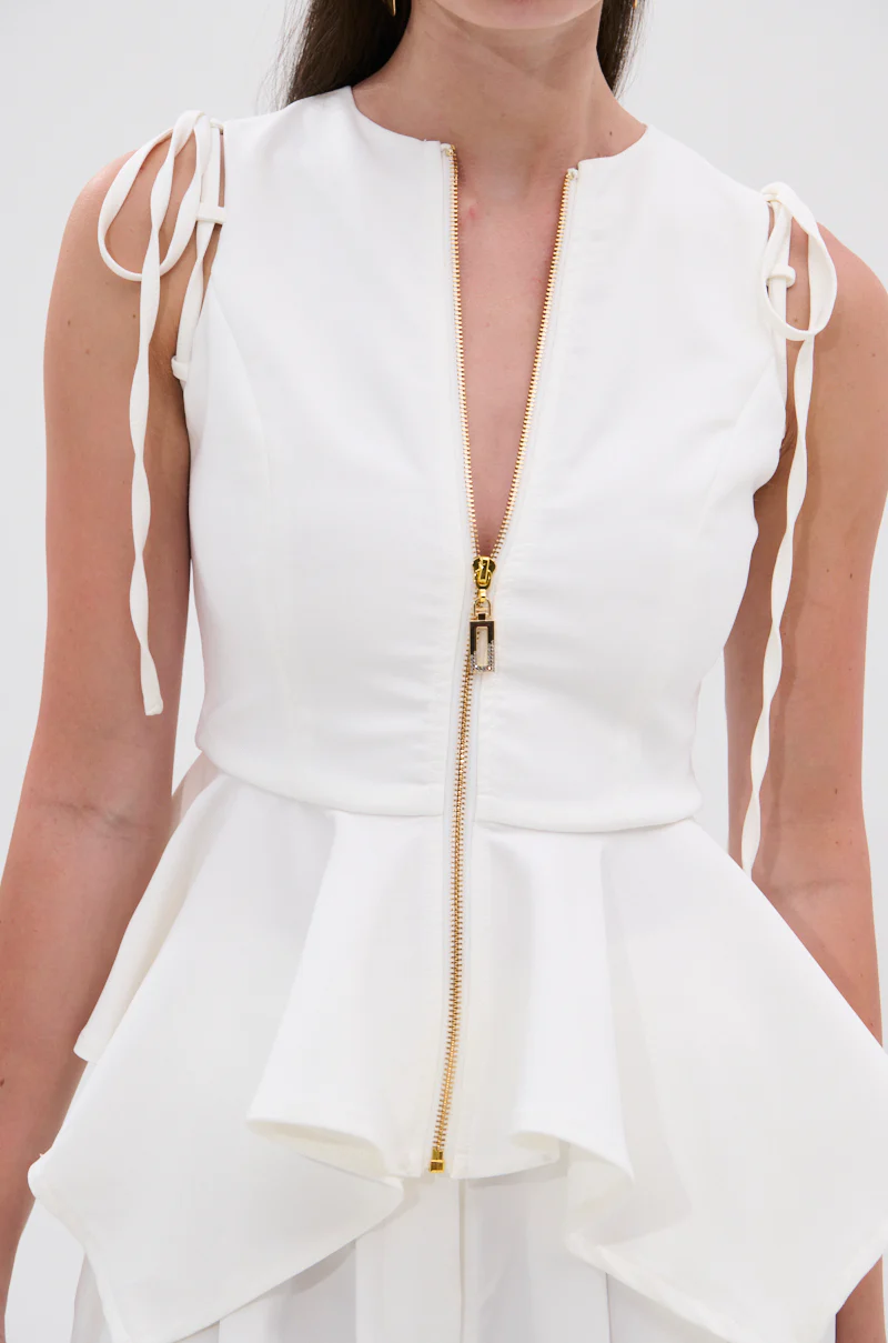 PEPLUM FRONT ZIP SLEEVELESS BLOUSE IN WHITE - Image 6