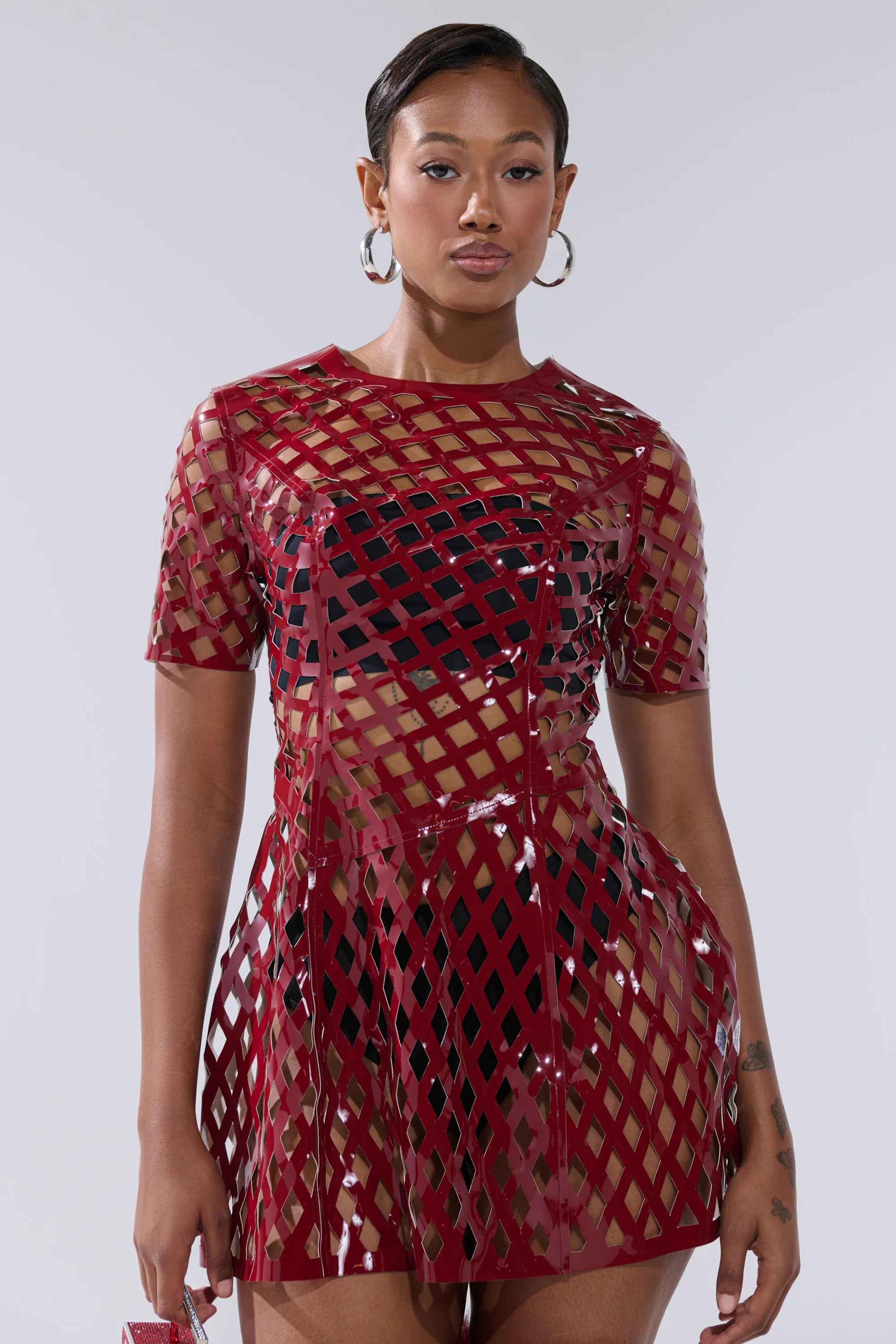 SHE'S DIFFERENT CUT OUT FAUX LEATHER MINI DRESS IN BURGUNDY